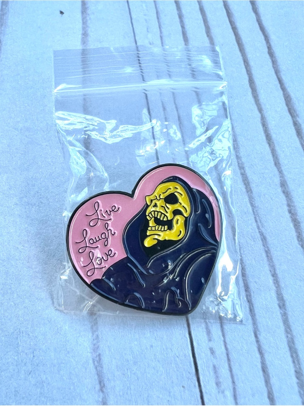 Skeletor “Live, Laugh, Love” Enamel Pin